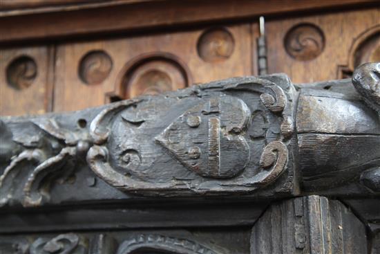 A 17th century Flemish carved oak coffer front, overall 5ft 7in. x 2ft 3in.